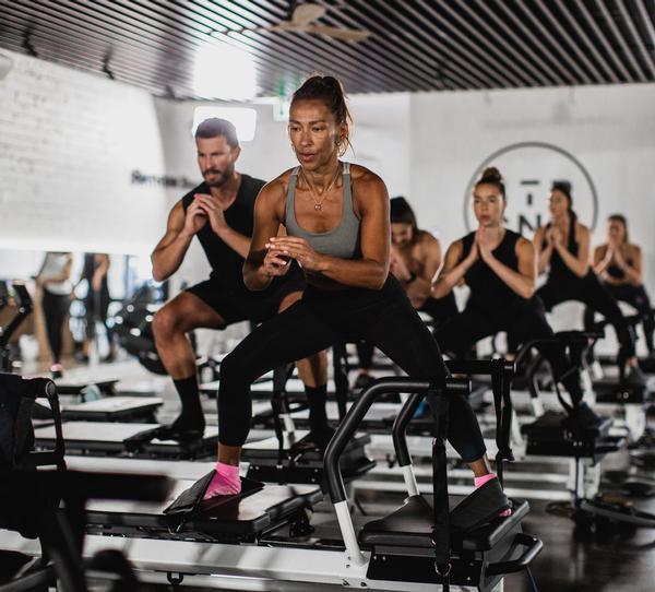 STRONG classes take place on a ‘rowformer’ machine – part reformer bed, part rowing machine