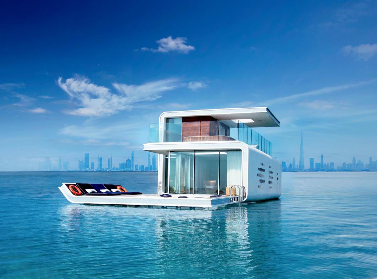 Kleindienst has designed three-layer floating Seahorse villas which are partially submerged underwater / Kleindienst group