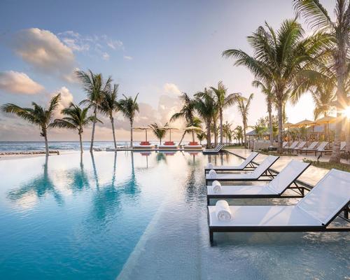 Guests can relax next to the resort's infinity-edge pool