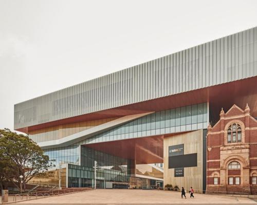 The new museum integrates five renovated and redeveloped heritage buildings with an entirely new building / Hassel + OMA