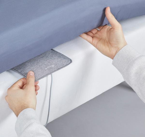 A non-wearable device, the Sleep Analyzer is placed under a mattress and provides insights via an app / PHOTO: Withings
