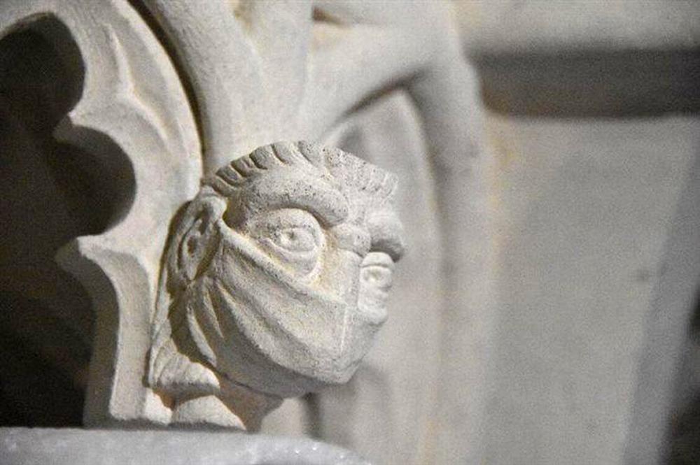 The shrine of St Amphibalus now features a carving with a facemask / St Albans Cathedral