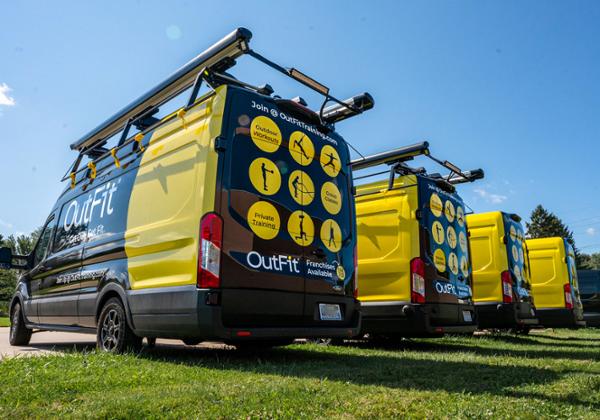 The fleet of vans act like travelling billboards to attract new members / photo: Randy Hetrick/Outfit