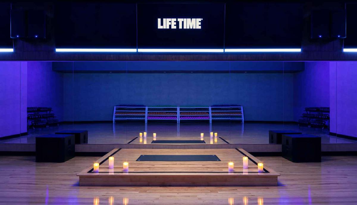 Facilities include dedicated studios for Life Time's group fitness programming / Life Time