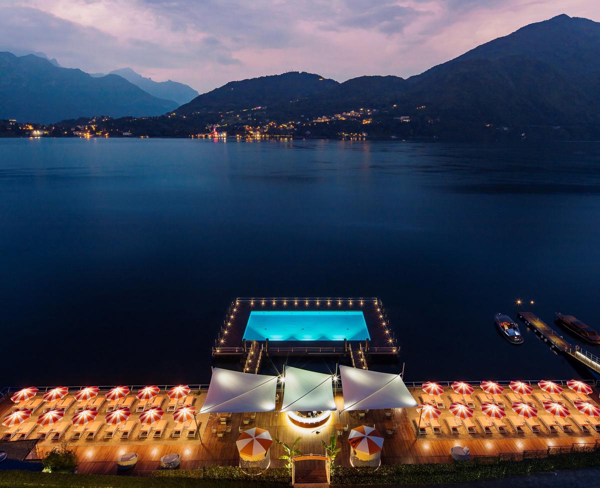 Retreat guests can upgrade their package with a guided stargazing meditation session at the hotel's pool floating within Lake Como