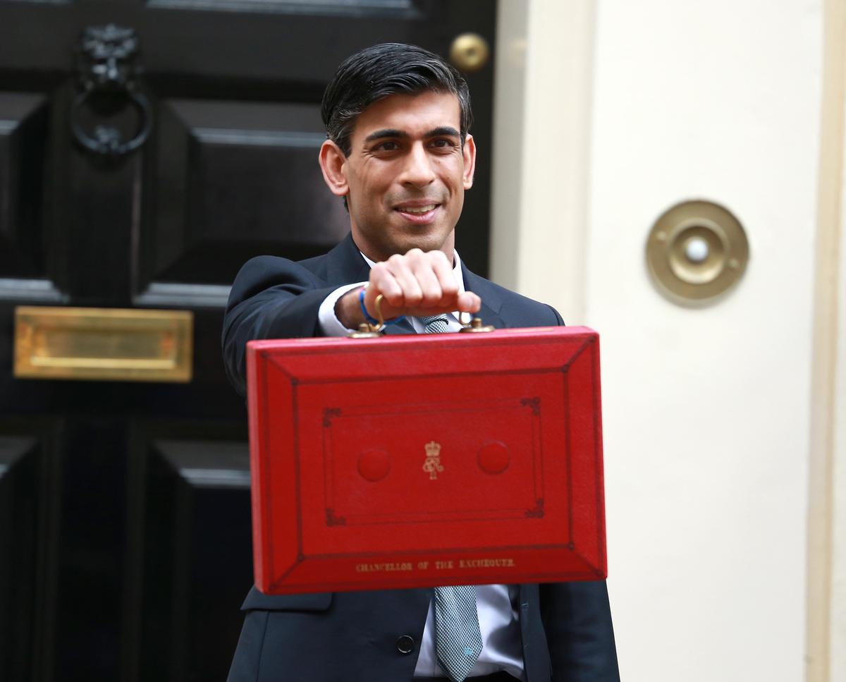 The cut was announced in today's Autumn Budget by chancellor Rishi Sunak (pictured) / Shutterstock/Cubankite