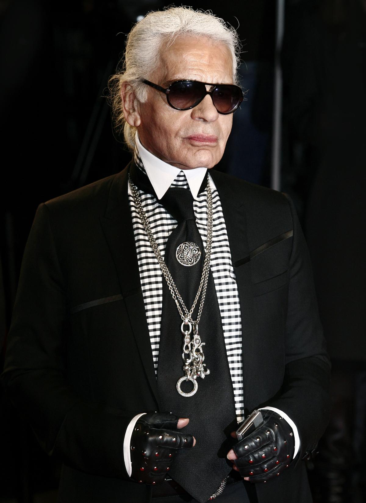Karl Lagerfeld worked with major global fashion brands including Balmain, Chanel, Fendi and Valentino / Shutterstock/Andrea Raffin