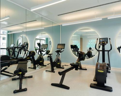 The property features a 24-hour health club and wellness studio / Grainger