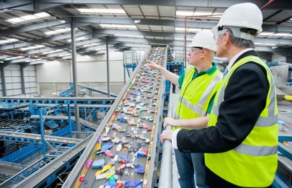 The team visited a recycling plant to learn about waste reduction / Photo: Shutterstock/Juice Flair