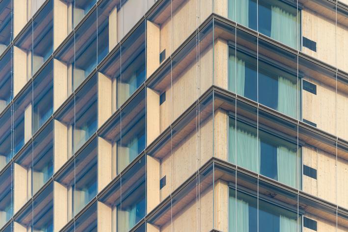 Triple-glased floor to ceiling windows contribute to the building's carbon-positive rating / Wood Hotel/Elite Hotels