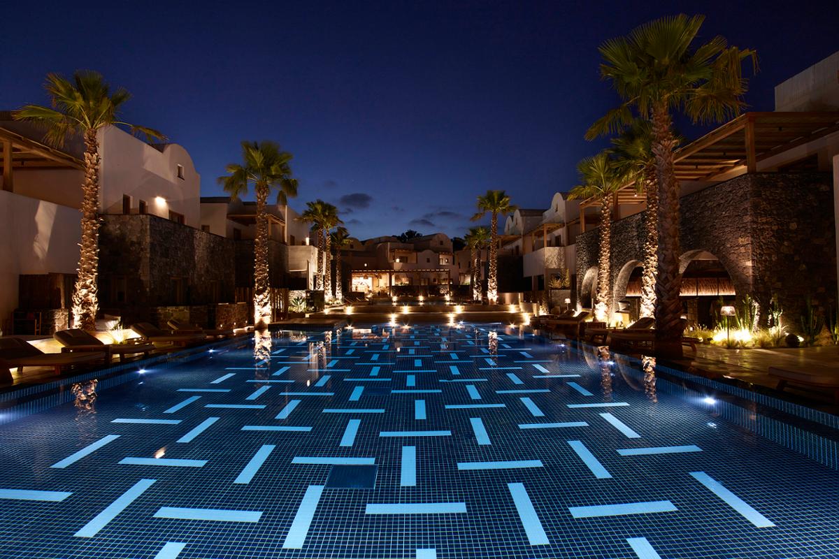 Acting as the centre of the resort, the master pool features a meandering black-and-white tiled pattern / Radisson Blu Zaffron Resort
