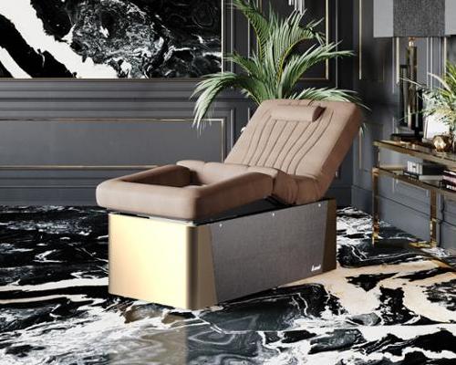 Designed with versatility in mind, the table consists of a traditional massage bed equipped with a built-in pedicure station / Lemi Group