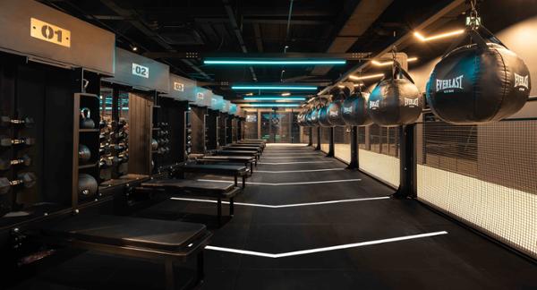Zones are sectioned off by cages to maintain the open-plan feel / photo: Everlast Gyms