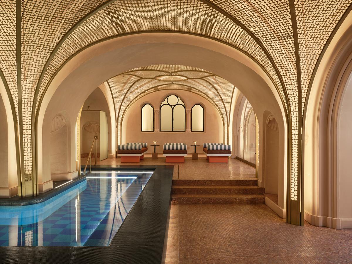 The new AWAY Spa in Budapest is anchored by a central pool area inspired by Budapest’s famous thermal baths / W Budapest