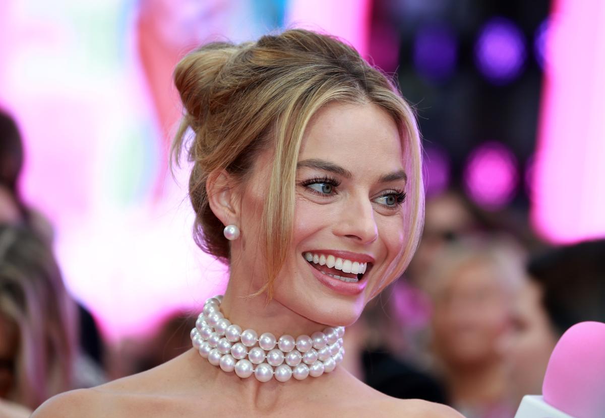 Margot Robbie topped the list as workout buddy / Shutterstock/Fred Duval