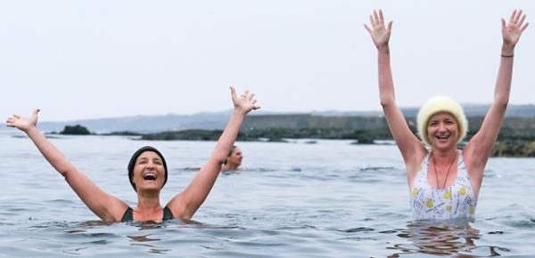Delegates braving the chilly waters of the North Sea / photo: Global Wellness Summit 2024