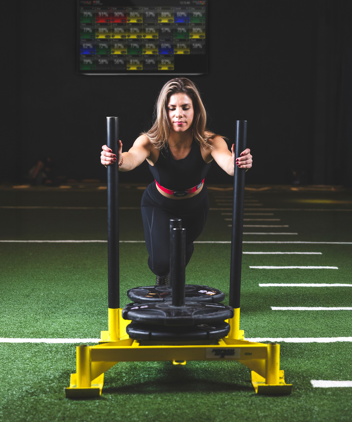 Woman pushing weights