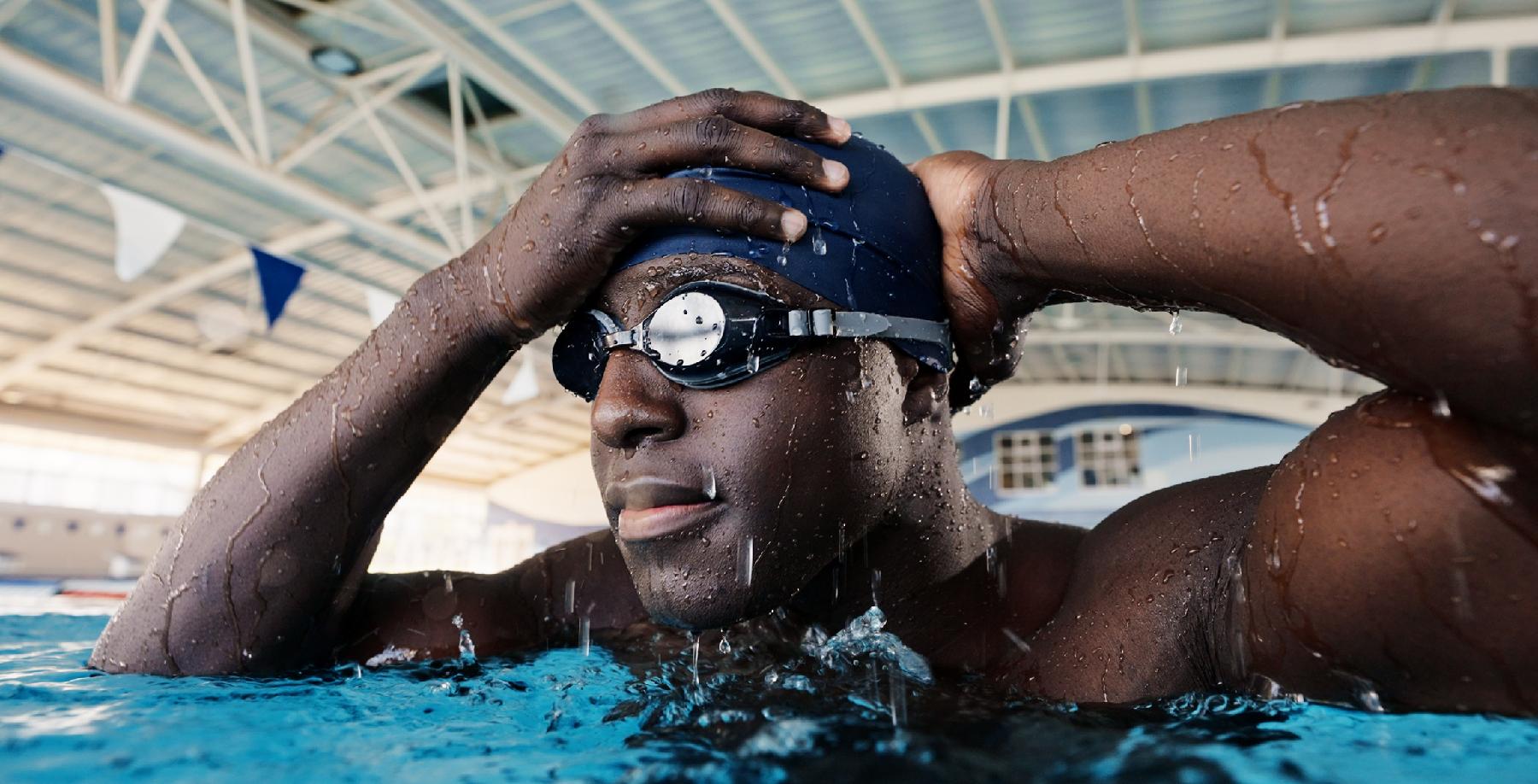 Man swimming in pool