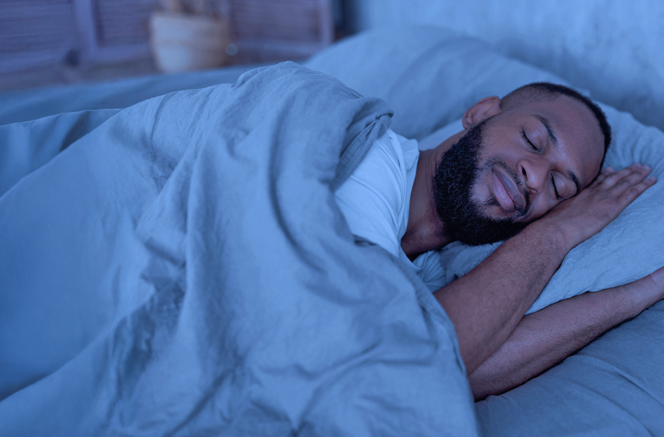 Man in bed sleeping