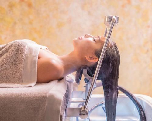 The new Shirobody treatment bed, with the Shirodara waterfall, is designed to provide massage and water-based therapies / Nilo Spa Design