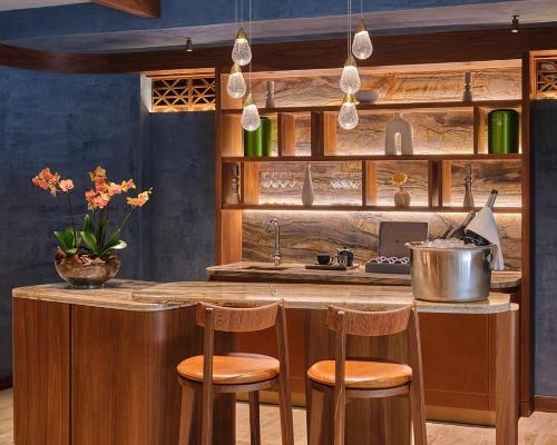 Spa guests are invited to have a drink at its celebration bar in a relaxation room before treatments / St Regis Cap Cana Resort
