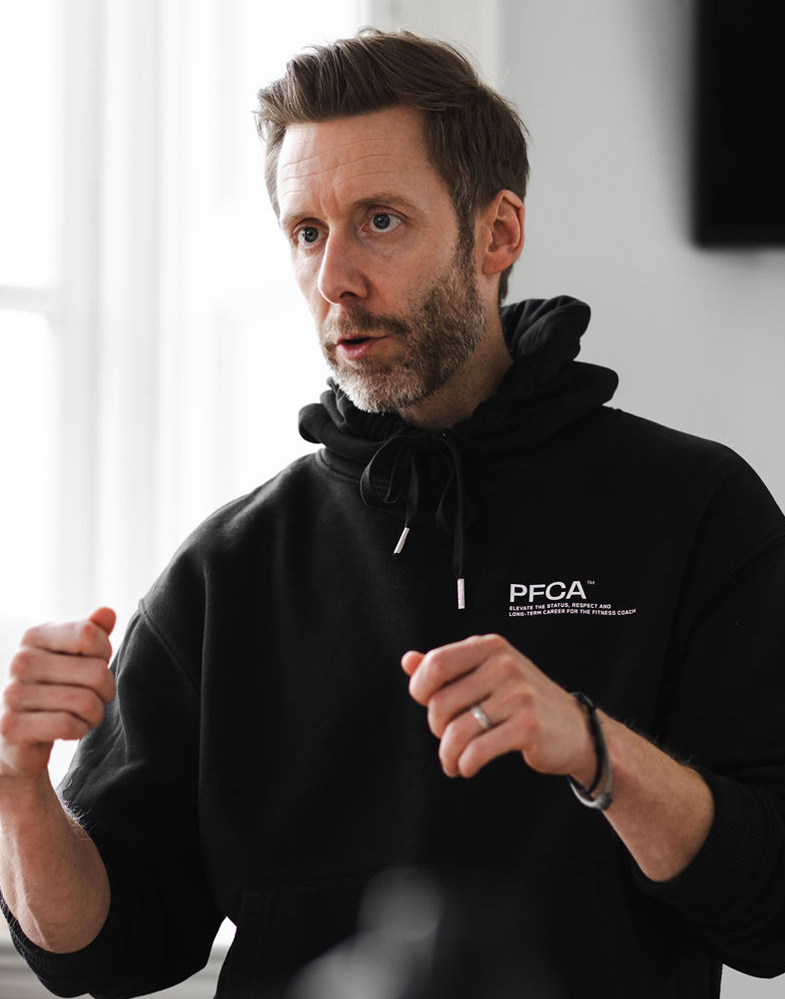 Man wearing PFCA branded clothing
