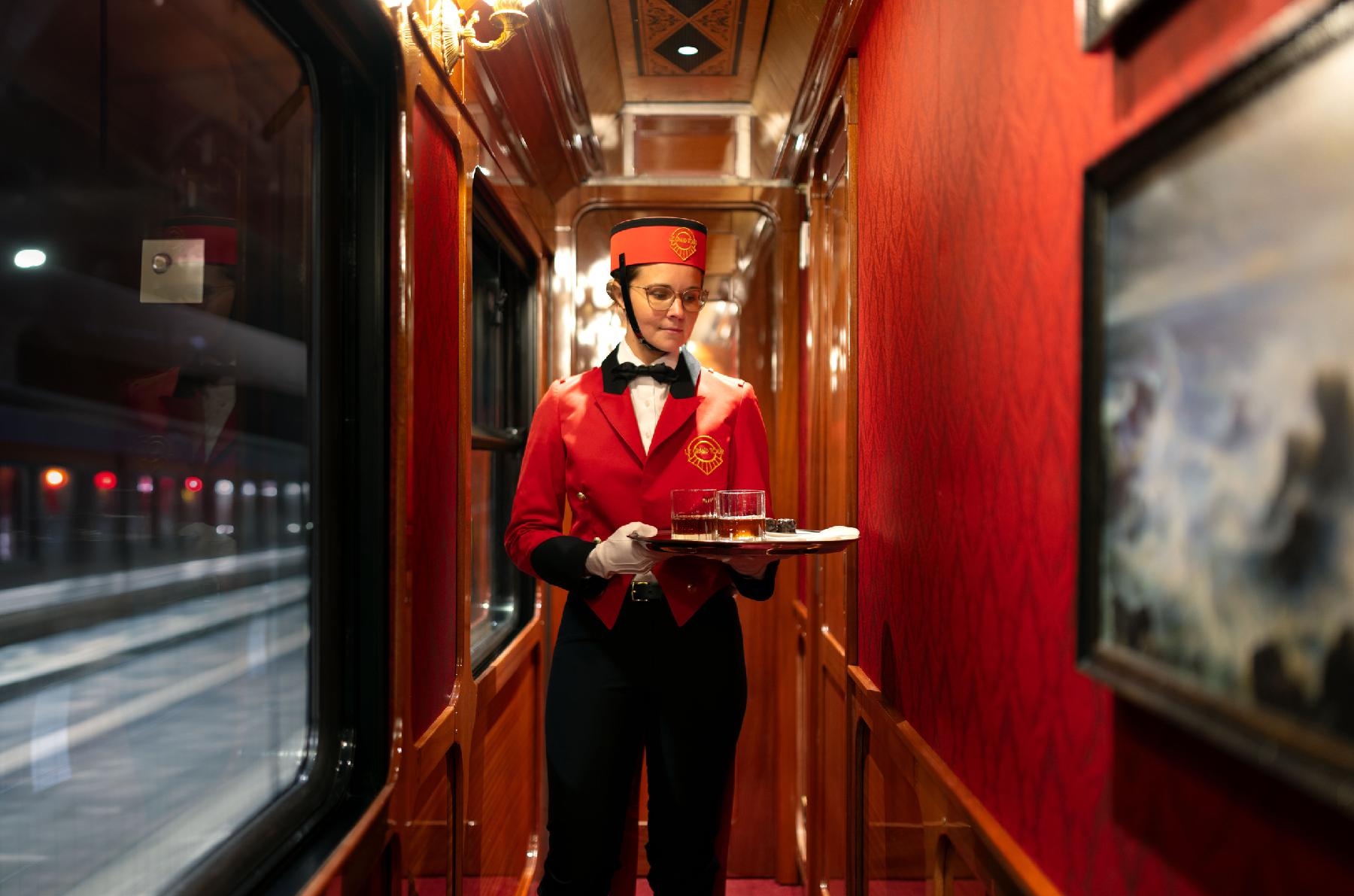 staff member in period outfit