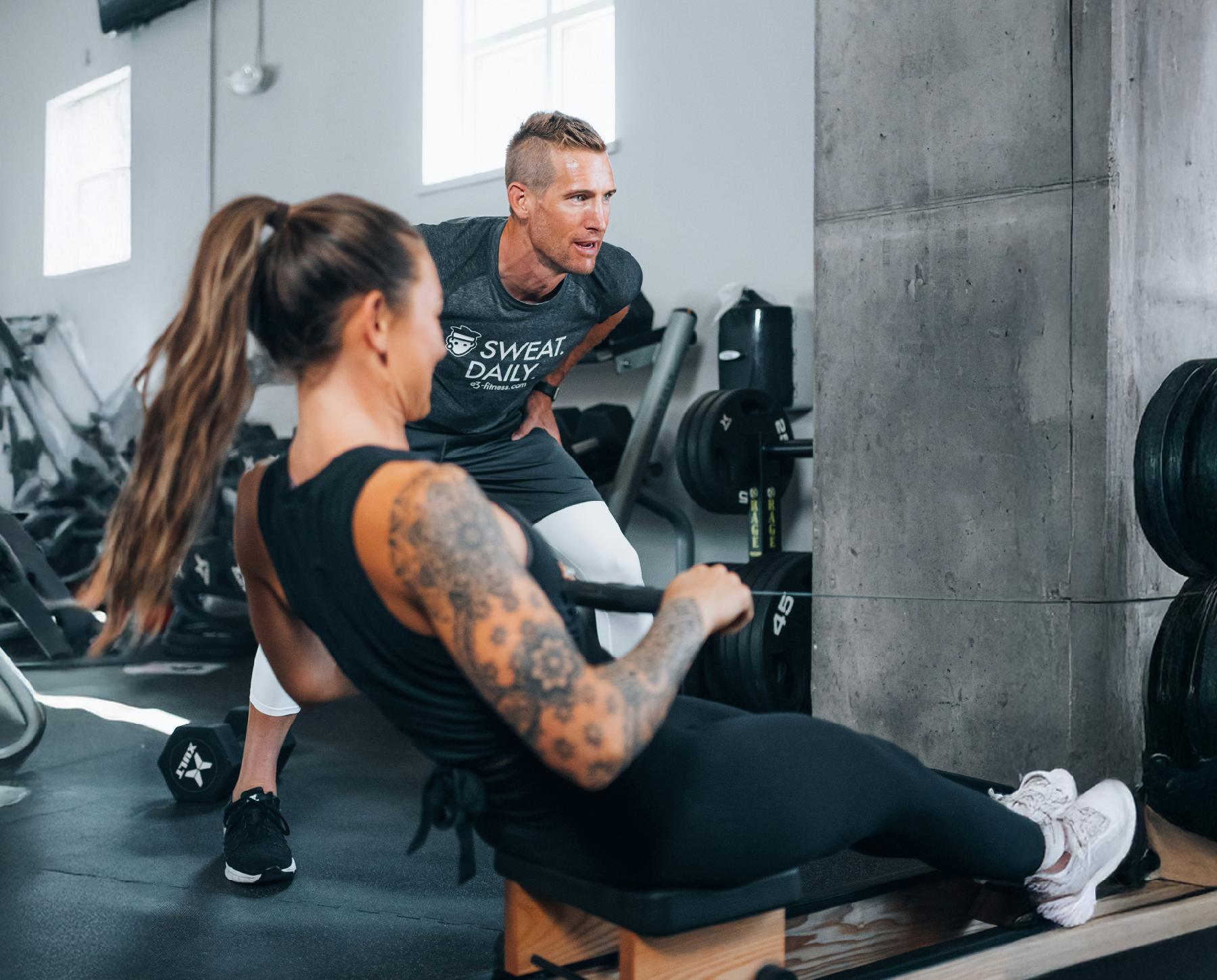 Woman using gym equipment