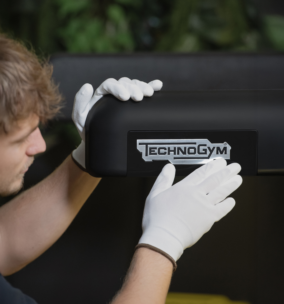 Technician checking Technogym equipment