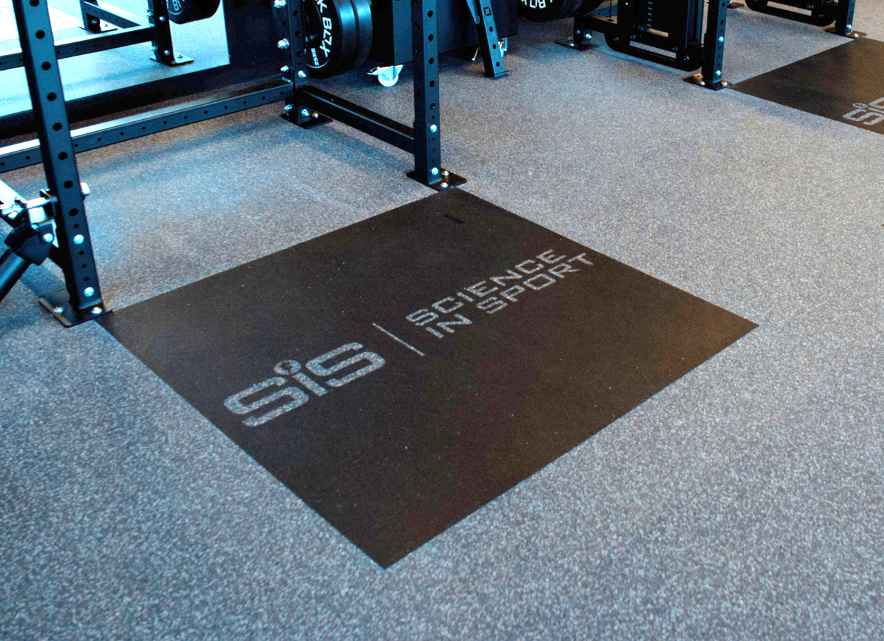 Floor mat branded with Science in Sport logo