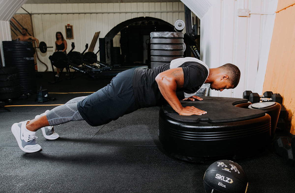 Man in press up position
