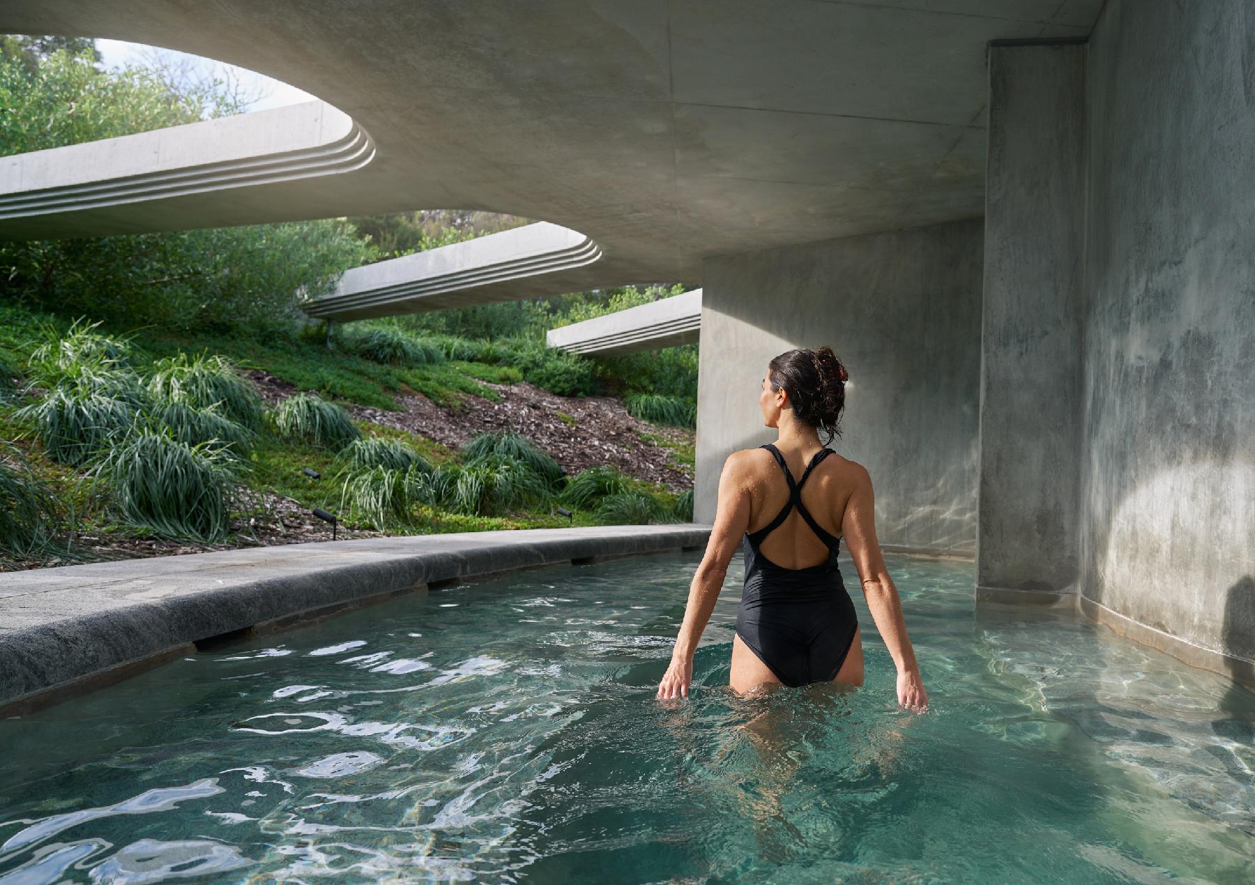 Woman walking in pool