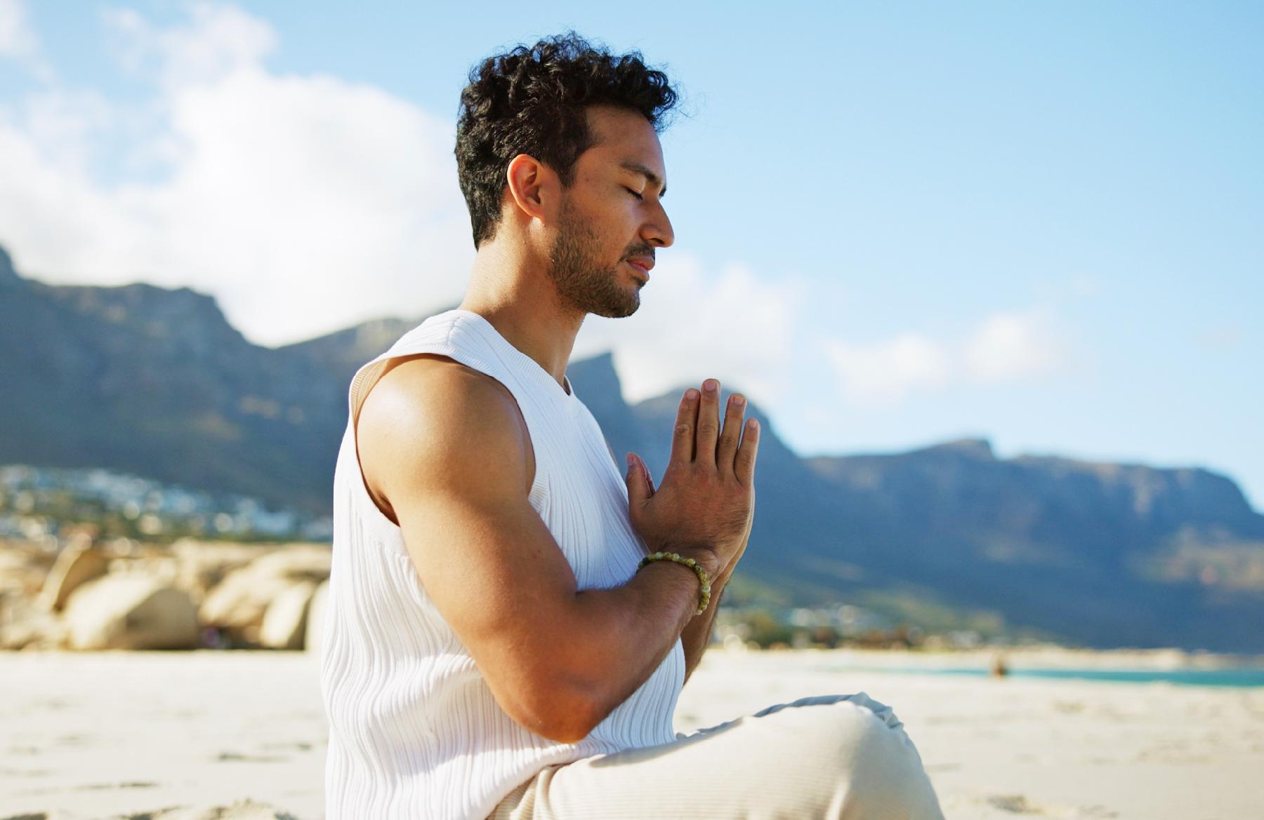 Man with praying hand pose