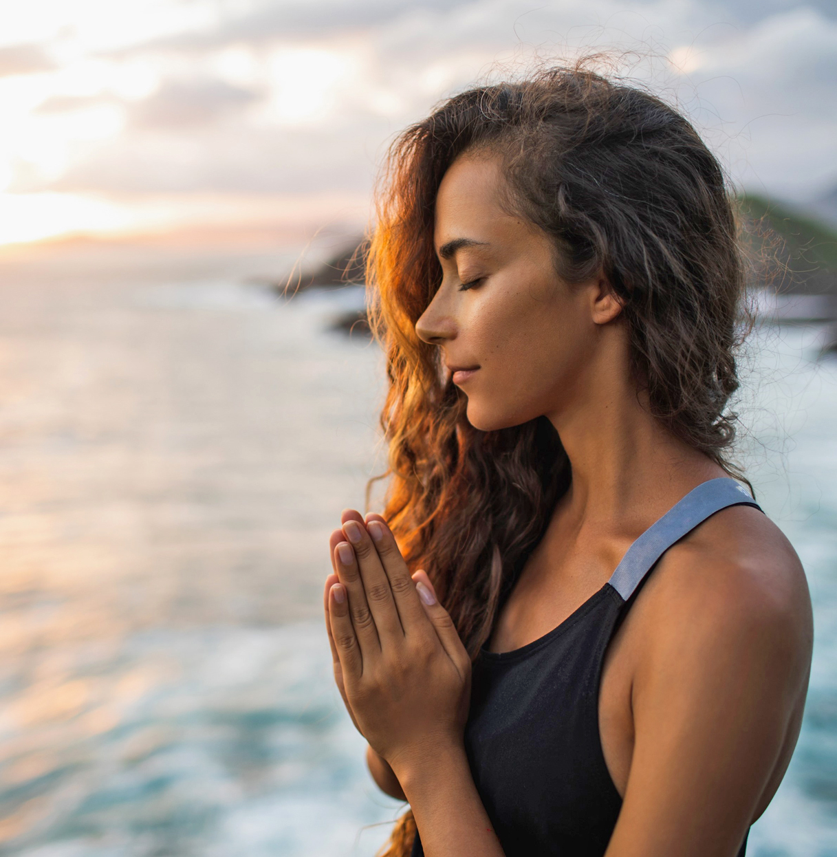 Woman with praying hands
