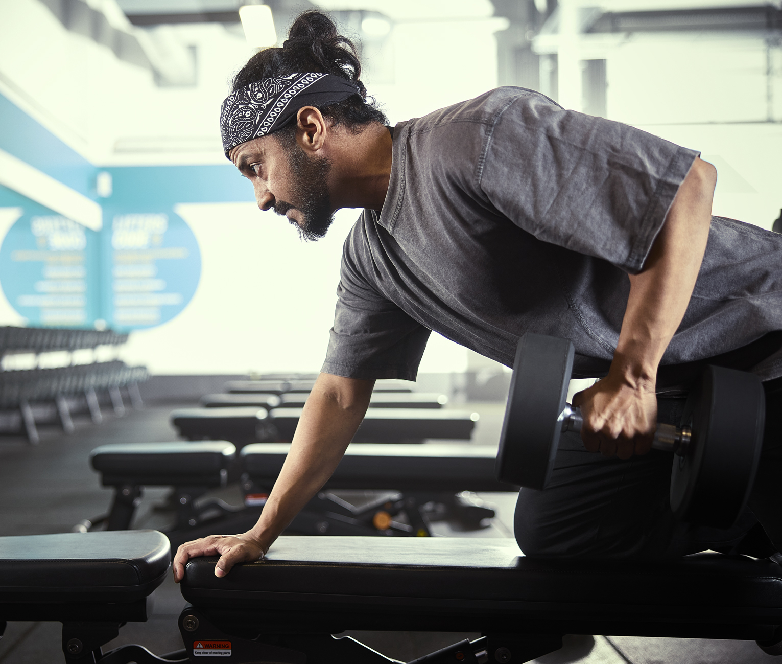 Man lifting hand weight