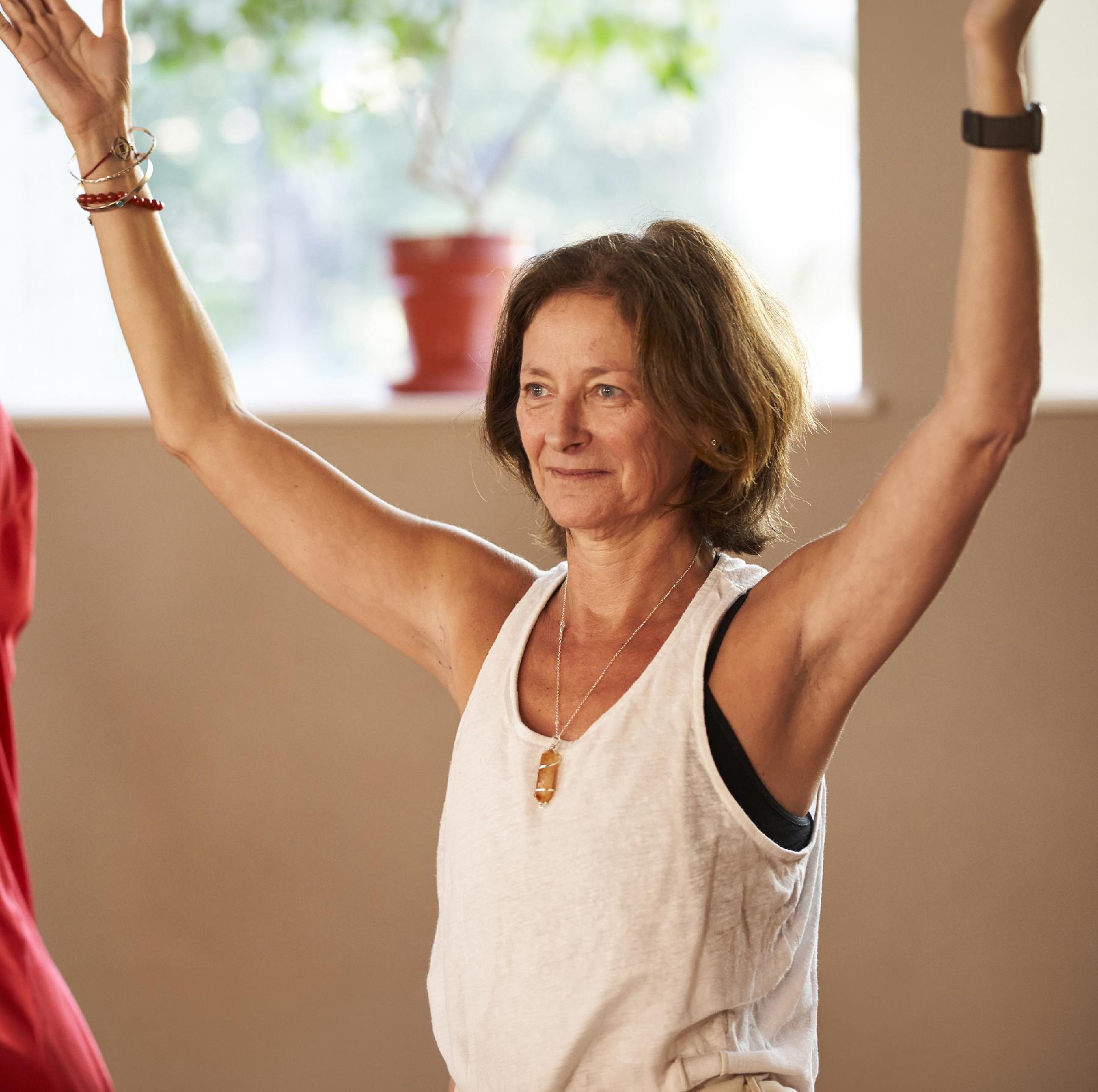 Woman with arms up