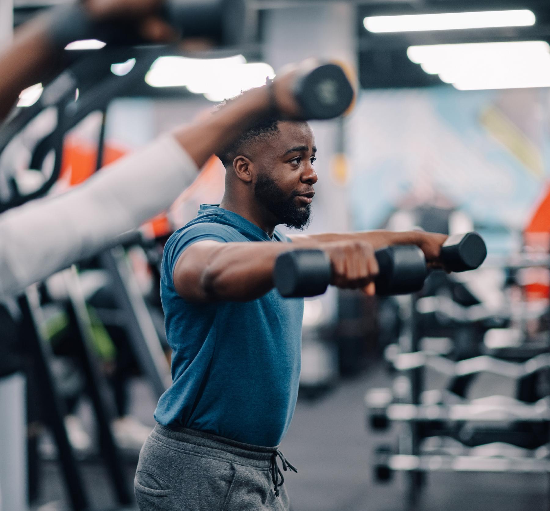 Man lifting hand weights
