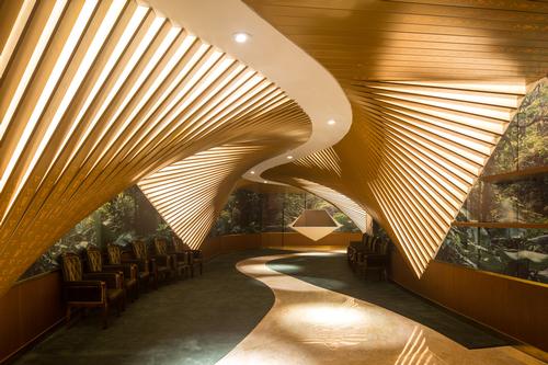 The roof also allows for natural ventilation of the mezzanine lobby, with openings offering views of the surrounding area / Tim Franco courtesy of Stufish Entertainment Architects