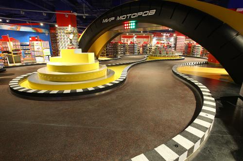 The toy store includes a mini race track / Paragon Creative