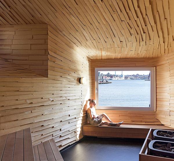 The sauna was made with entirely recycled materials, with a wooden interior and corrugated iron cladding