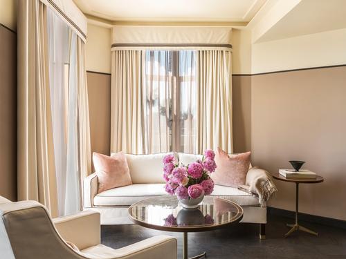 Each of the rooms has been enriched with dusty pinks, soft creams and brown accents
