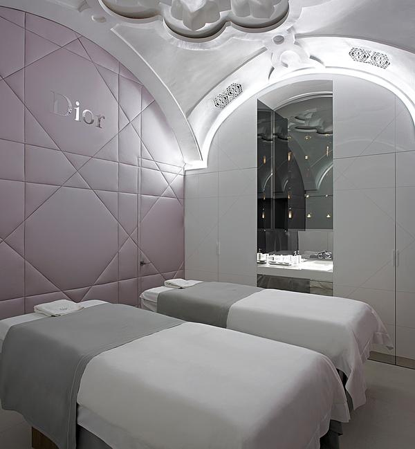 The white and silver decor is trademark Dior 