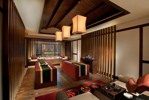 The deluxe spa treatment room offers is designed in an Oriental theme