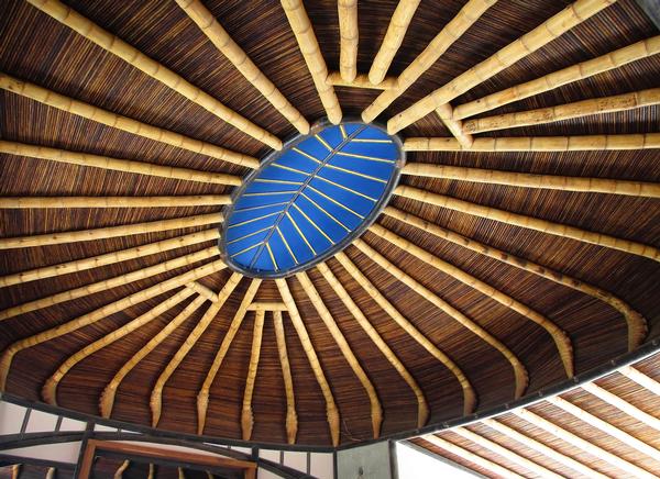 Detail from a bamboo roof structure; and Crosswaters Ecolodge in China’s Guangdong province