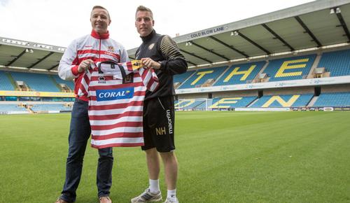 Wigan Warriors took on Catalan Dragons at Millwall's New Den last year / Wigan Warriors