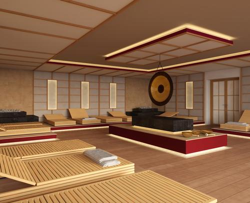 A Japanese Onsen area a meditation room with a large gong and smaller singing bowls that a therapist activates / Thermarium