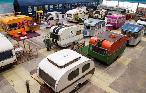 The themes for the caravans include 'Big Ben' and 'Flower Power' / Basecamp Young Hostel Bonn