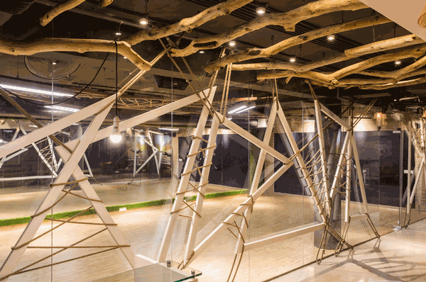 Wooden branches form part of the ceiling