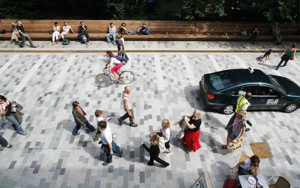 New Road has become a place where people like to linger, rather than just be in transit