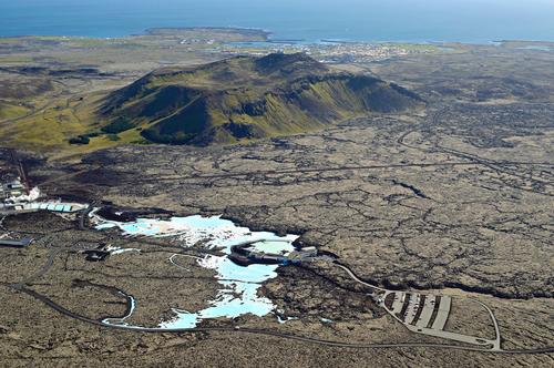 The resort is overlooked by steep hills, beyond which, sits the Icelandic coastline